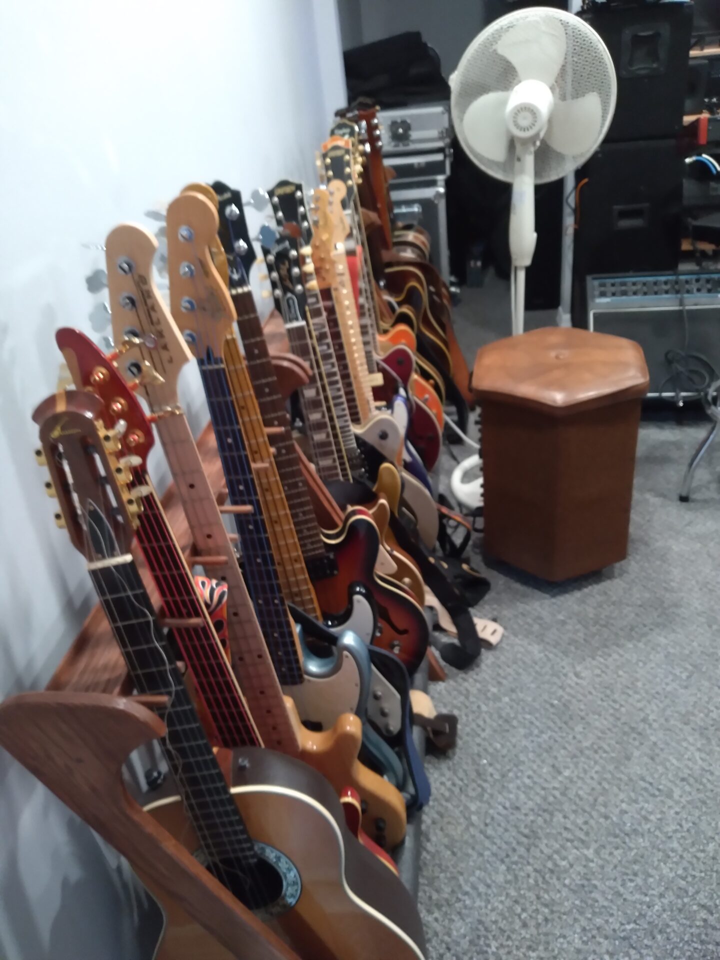 Assembly of Guitars and A Fan